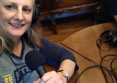 A woman recoding a podcast